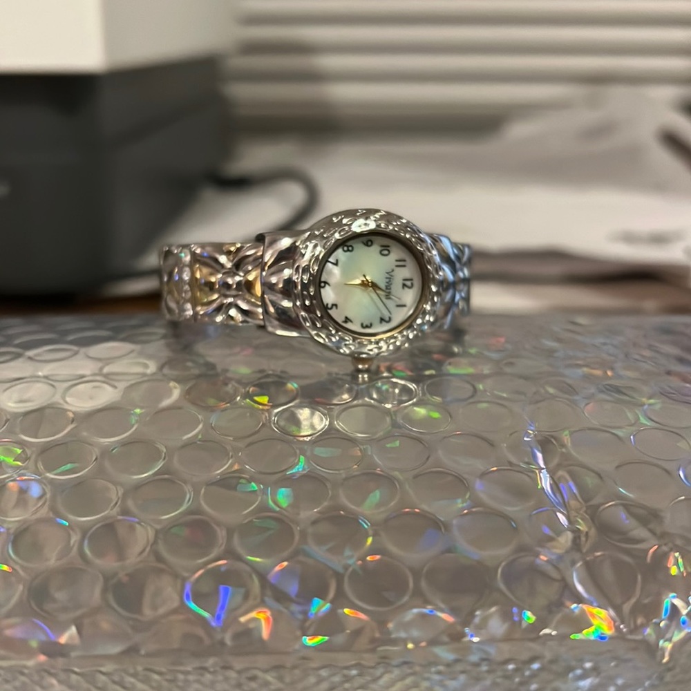 Womens Mother Of Pearl watch. In pristine condition.